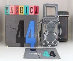 Yashica 44 Baby Grey, 4X4 Camera, Lens Yashikor 3.5/60MM & Original Design Box. Fixed Price $240.00.